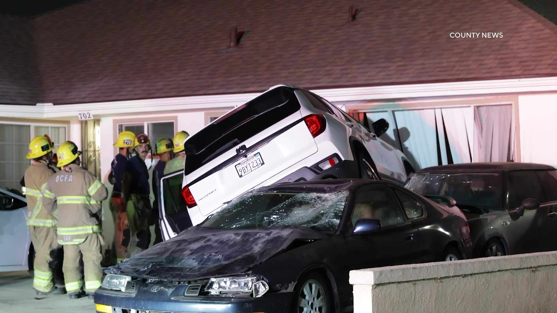 Santa Ana: SUV Crashes Into Home, Topples Vehicles In Driveway